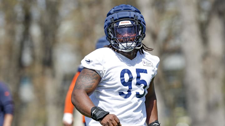 May 9, 2025; Lake Forest, IL, USA; Chicago Bears defensive line Shemar Turner (95) warms up during the Rookie Minicamp at Halas Hall. Mandatory Credit: Kamil Krzaczynski-Imagn Images