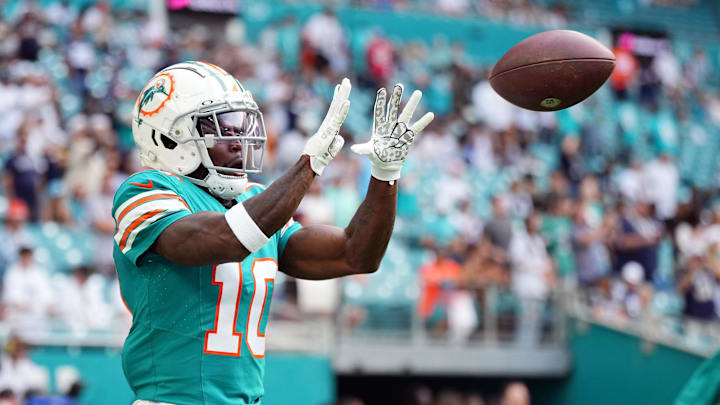 Dec 24, 2023; Miami Gardens, Florida, USA; Miami Dolphins wide receiver Tyreek Hill (10) warms up