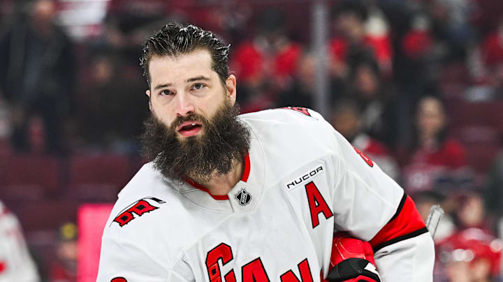 Apr 16, 2025; Montreal, Quebec, CAN; Carolina Hurricanes defenseman Brent Burns (8) looks on in warm-up before the game against the Montreal Canadiens at Bell Centre.