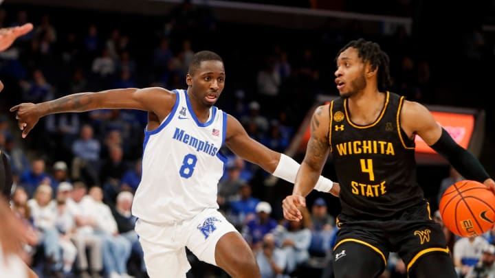 Memphis' David Jones (8) guards Wichita State's Colby Rogers (4) during the game between Wichita State and University of Memphis at FedExForum in Memphis, Tenn., on Saturday, February 3, 2024.