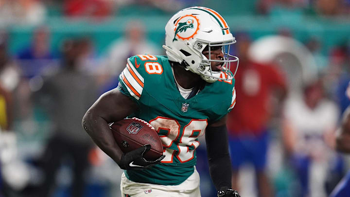 Sep 12, 2024; Miami Gardens, Florida, USA; Miami Dolphins running back De'Von Achane (28) rushes with the ball against the Buffalo Bills during the second half at Hard Rock Stadium. Mandatory Credit: Jasen Vinlove-Imagn Images