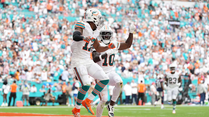 Miami Dolphins wide receiver Jaylen Waddle (17) celebrates his touchdown against the New England Patriots with wide receiver Tyreek Hill (10) during the second half at Hard Rock Stadium last season.