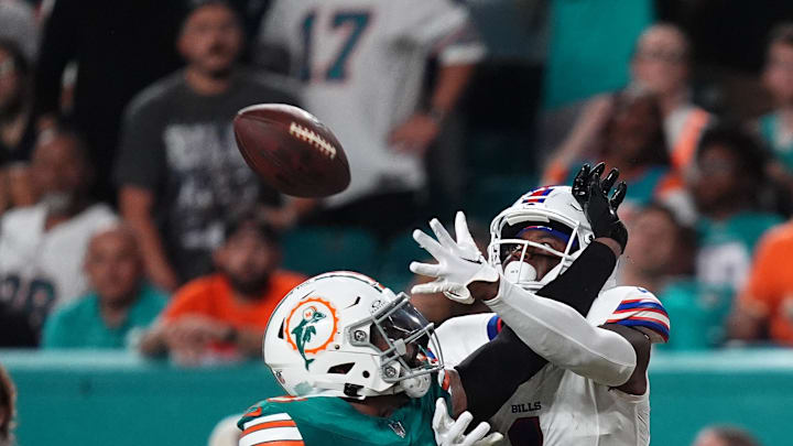 Miami Dolphins linebacker Jordyn Brooks (20) breaks up the pass to Buffalo Bills wide receiver Curtis Samuel (1) during the first half at Hard Rock Stadium in Week 2.