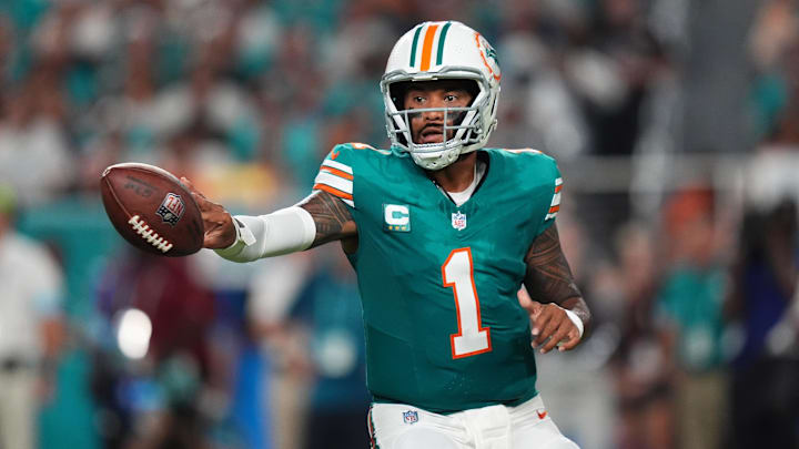 Miami Dolphins quarterback Tua Tagovailoa (1) tosses the ball during the first half against the Buffalo Bills at Hard Rock Stadium on Thursday night.