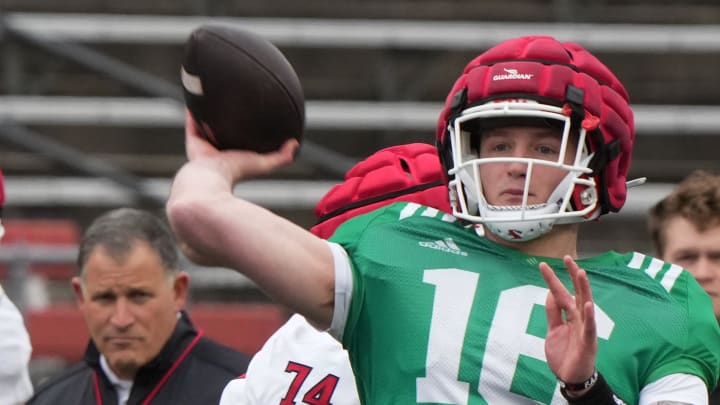 Piscataway, NJ -- April 27, 2024 -- Coach Greg Schiano and quarterback, Athan Kaliakmanis during Rutgers annual spring football game at SHI Stadium.