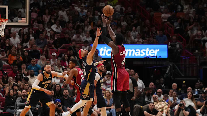 Miami Heat guard Victor Oladipo (4) shoots over New Orleans Pelicans guard Jose Alvarado (15) during the second half at Miami-Dade Arena. 