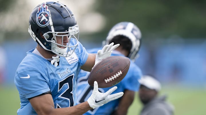 Aug 22, 2022; Nashville, Tennessee; Tennessee Titans cornerback Caleb Farley (3) pulls in a catch during a training camp practice at Ascension Saint Thomas Sports Park.   Mandatory Credit: George Walker IV-Imagn Images