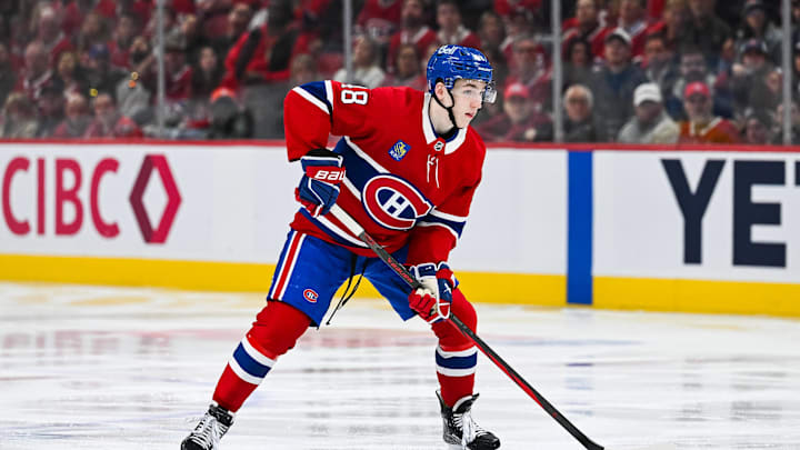 Apr 27, 2025; Montreal, Quebec, CAN; Montreal Canadiens defenseman Lane Hutson (48) considers his options with the puck against the Washington Capitals during the third period in game four of the first round of the 2025 Stanley Cup Playoffs at Bell Centre. Mandatory Credit: David Kirouac-Imagn Images
