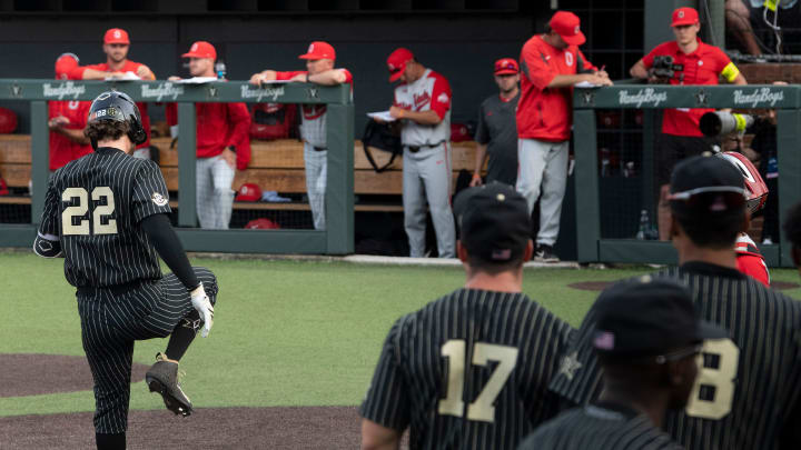 Vanderbilt first baseman Julian Infante (22) stomps on home plate after hitting a solo homer in the fourth inning against Ohio State during the NCAA Division I Baseball Regionals at Hawkins Field Friday, May 31, 2019, in Nashville, Tenn. 

Nas Vanderbilt Ohio State 001