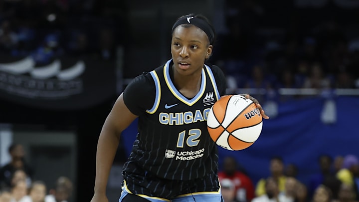 Aug 25, 2025; Chicago, Illinois, USA; Chicago Sky forward Michaela Onyenwere (12) controls the ball against the Las Vegas Aces during the first half at Wintrust Arena. Mandatory Credit: Kamil Krzaczynski-Imagn Images