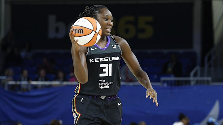 Connecticut Sun center Tina Charles (31) looks to pass the ball against the Chicago Sky during the first half at Wintrust Arena. 