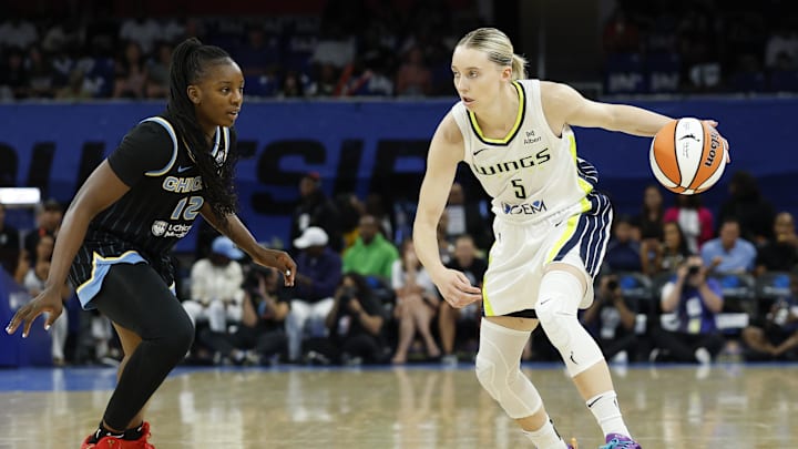 Dallas Wings guard Paige Bueckers drives to the basket against Chicago Sky forward Michaela Onyenwere