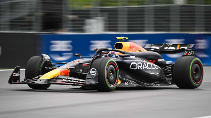 Jun 7, 2024; Montreal, Quebec, CAN; Red Bull Racing driver Sergio Perez (MEX) races during FP2 practice session of the Canadian Grand Prix at Circuit Gilles Villeneuve. Mandatory Credit: David Kirouac-USA TODAY Sports