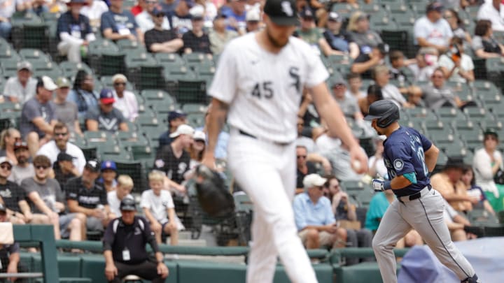 Seattle Mariners catcher Cal Raleigh (29) rounds the bases after hitting a two-run home run against the Chicago White Sox during the first inning at Guaranteed Rate Field on July 28.