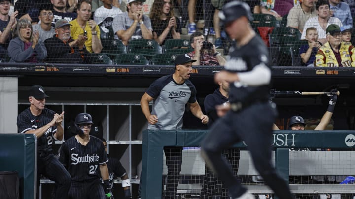 Chicago White Sox interim manager Grady Sizemore (24) celebrates as outfielder Gavin Sheets (32) scores against the New York Yankees during the seventh inning at Guaranteed Rate Field on Aug 12.