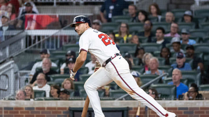 Atlanta Braves first base Matt Olson (28) runs to first base after hitting a ground ball against Philadelphia Phillies during the seventh inning at Truist Park on Aug 22.