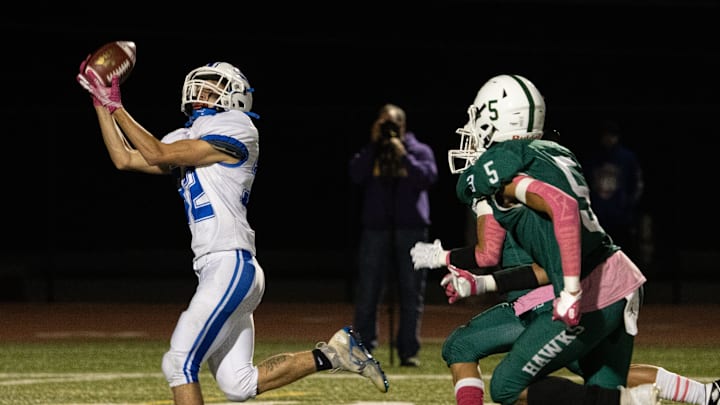 Geneseo/Mt. Morris' Tyler Churchfield catches a pass deep in Avon territory. Geneseo/Mt. Morris' Tyler Churchfield catches a pass deep in Avon territory.