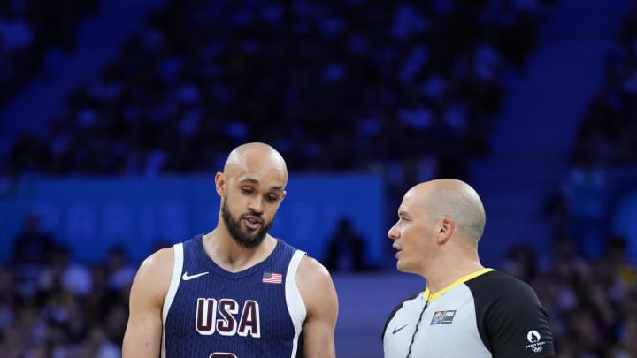 Jul 28, 2024; Villeneuve-d'Ascq, France; United States guard Derrick White (8) talks to an official in the third quarter against Serbia during the Paris 2024 Olympic Summer Games at Stade Pierre-Mauroy. Mandatory Credit: John David Mercer-USA TODAY Sports