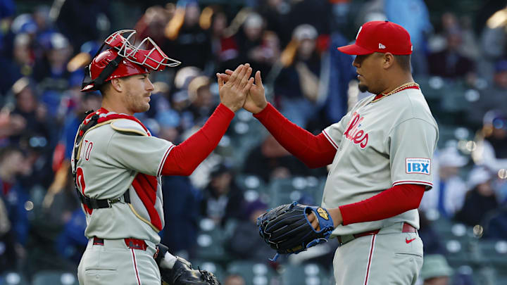 Apr 26, 2025; Chicago, Illinois, USA; Philadelphia Phillies pitcher Carlos Hernández (35) celebrates with catcher J.T. Realmuto (10) team's win against the Chicago Cubs at Wrigley Field Apr 26, 2025; Chicago, Illinois, USA; Philadelphia Phillies pitcher Carlos Hernández (35) celebrates with catcher J.T. Realmuto (10) team's win against the Chicago Cubs at Wrigley Field