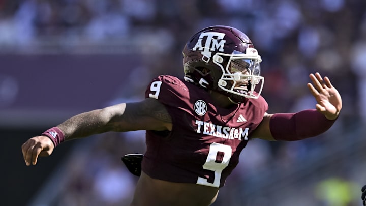 Sep 27, 2025; College Station, Texas, USA; Texas A&M Aggies defensive end Cashius Howell (9) defends in coverage against the Auburn Tigers during the first half at Kyle Field. Mandatory Credit: Maria Lysaker-Imagn Images 