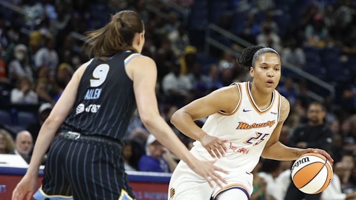 Aug 3, 2025; Chicago, Illinois, USA; Phoenix Mercury forward Alyssa Thomas (25) brings the ball up court against Chicago Sky guard Rebecca Allen (9) during the first half at Wintrust Arena. Mandatory Credit: Kamil Krzaczynski-Imagn Images