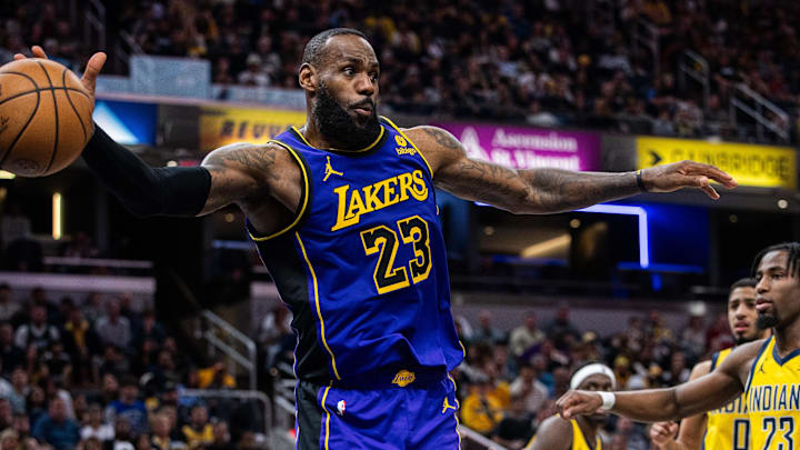 Mar 29, 2024; Indianapolis, Indiana, USA; Los Angeles Lakers forward LeBron James (23) passes the