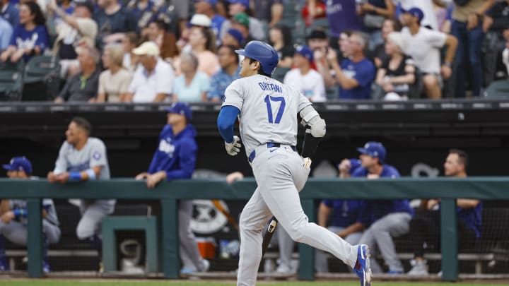 Jun 25, 2024; Chicago, Illinois, USA; Los Angeles Dodgers designated hitter Shohei Ohtani (17) rounds the bases after hitting a solo home run against the Chicago White Sox during the first inning at Guaranteed Rate Field. Mandatory Credit: Kamil Krzaczynski-USA TODAY Sports