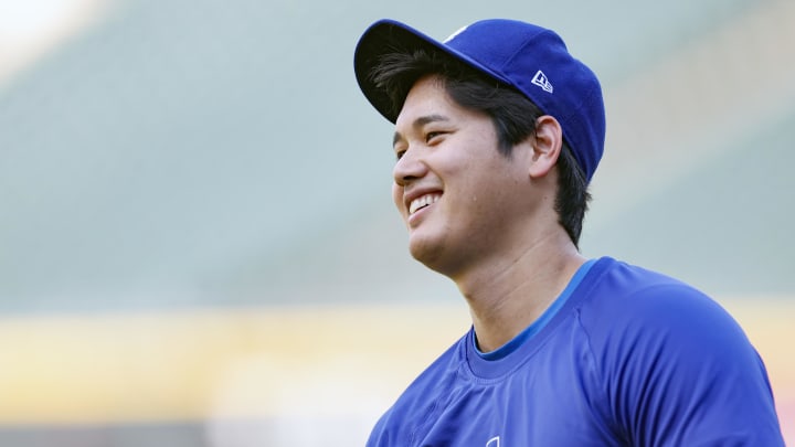 Jun 26, 2024; Chicago, Illinois, USA; Los Angeles Dodgers designated hitter Shohei Ohtani (17) smiles before a game against the Chicago White Sox at Guaranteed Rate Field. Mandatory Credit: Kamil Krzaczynski-USA TODAY Sports