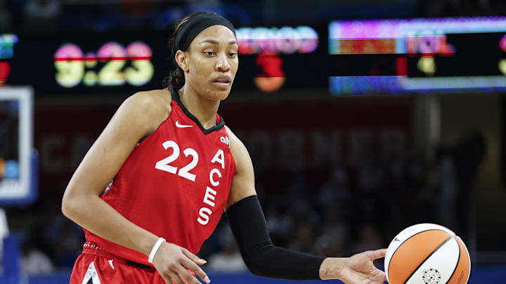 Las Vegas Aces center A'ja Wilson passes the ball during a game.