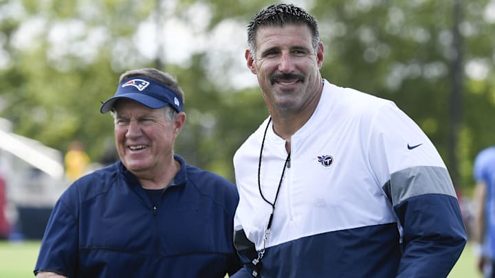 Bill Belichick shares a laugh with Mike Vrabel. Bill Belichick shares a laugh with Mike Vrabel.
