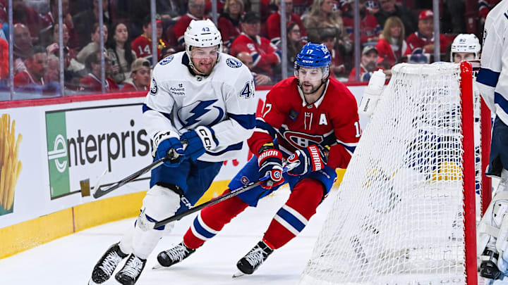 Apr 26, 2026; Montreal, Quebec, CAN; Tampa Bay Lightning defenseman Darren Raddysh (43) defends the puck against Montreal Canadiens right wing Josh Anderson (17) during the third period in game four of the first round of the 2026 Stanley Cup Playoffs at Bell Centre. Mandatory Credit: David Kirouac-Imagn Images