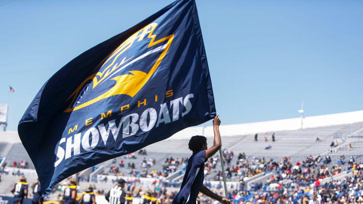 Anthony Miller, with the Showboats hype squad, runs across the end zone with a Showboats flag after the team scored during the UFL game between the San Antonio Brahmas and Memphis Showboats in Simmons Bank Liberty Stadium in Memphis, Tenn., on Saturday, April 6, 2024.