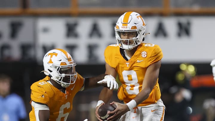 Nov 25, 2023; Knoxville, Tennessee, USA; Tennessee Volunteers running back Dylan Sampson (6) and quarterback Nico Iamaleava (8) during the second half against the Vanderbilt Commodores at Neyland Stadium. Mandatory Credit: Randy Sartin-USA TODAY Sports