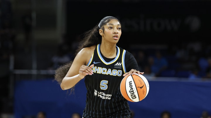 Aug 25, 2024; Chicago, Illinois, USA; Chicago Sky forward Angel Reese (5) looks to pass the ball against the Las Vegas Aces during the first half at Wintrust Arena. Mandatory Credit: Kamil Krzaczynski-USA TODAY Sports