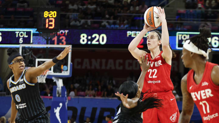 Aug 30, 2024; Chicago, Illinois, USA; Indiana Fever guard Caitlin Clark (22) shoots against the Chicago Sky during the first half at Wintrust Arena. Mandatory Credit: Kamil Krzaczynski-USA TODAY Sports