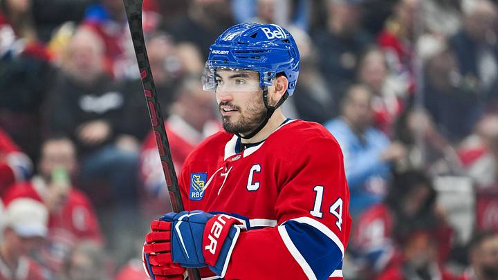 Montreal Canadiens center Nick Suzuki (14) looks on against the Buffalo Sabres during the second period at Bell Centre. Mandatory Credit: David Kirouac-Imagn Images