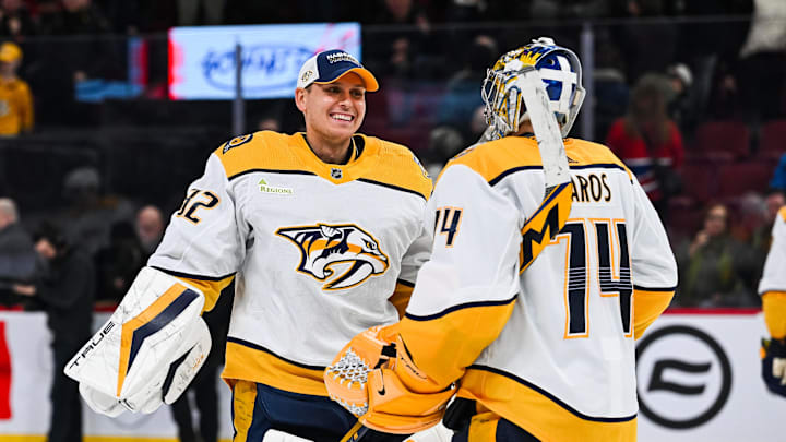 Dec 10, 2023; Montreal, Quebec, CAN; Nashville Predators goalie Kevin Lankinen (32) and goalie Juuse Saros (74) celebrate the win against the Montreal Canadiens after the third period at Bell Centre. Mandatory Credit: David Kirouac-Imagn Images