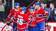 Mar 15, 2025; Montreal, Quebec, CAN; Montreal Canadiens right wing Cole Caufield (13) celebrates with his teammates his goal against the Florida Panthers in the first period at Bell Centre. Mandatory Credit: David Kirouac-Imagn Images