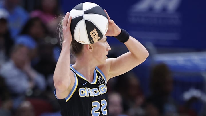 Jun 7, 2025; Chicago, Illinois, USA; Chicago Sky guard Courtney Vandersloot (22) looks to pass the ball against the Indiana Fever during the first half of a WNBA game at United Center. Mandatory Credit: Kamil Krzaczynski-Imagn Images