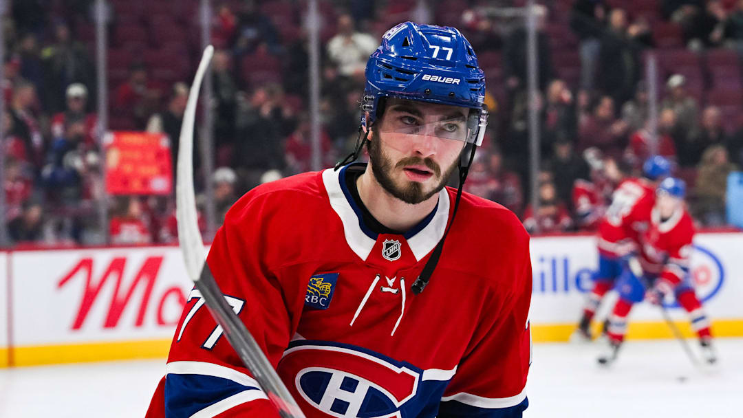 Nov 13, 2025; Montreal, Quebec, CAN; Montreal Canadiens center Kirby Dach (77) looks on during warm-up before the game against the Dallas Stars at Bell Centre. Mandatory Credit: David Kirouac-Imagn Images