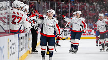 Apr 27, 2025; Montreal, Quebec, CAN; Washington Capitals left wing Andrew Mangiapane (88) celebrates with his teammates at the bench his goal against the Montreal Canadiens during the third period in game four of the first round of the 2025 Stanley Cup Playoffs at Bell Centre. Mandatory Credit: David Kirouac-Imagn Images