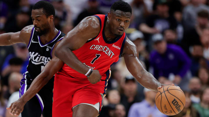 Apr 2, 2024; Sacramento, California, USA; New Orleans Pelicans forward Zion Williamson (1) dribbles the ball past Sacramento Kings forward Harrison Barnes (40) during the third quarter at Golden 1 Center.