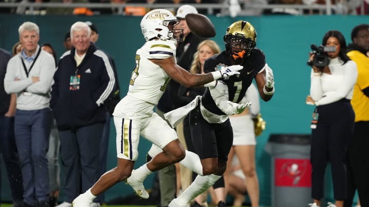 Dec 22, 2023; Tampa, FL, USA; UCF Knights wide receiver Javon Baker (1) catches a pass for a