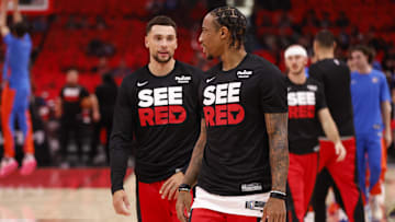 Oct 25, 2023; Chicago, Illinois, USA; Chicago Bulls guard Zach LaVine (8) and forward DeMar DeRozan (11) warms up before a basketball game against the Oklahoma City Thunder at United Center. Mandatory Credit: Kamil Krzaczynski-Imagn Images
