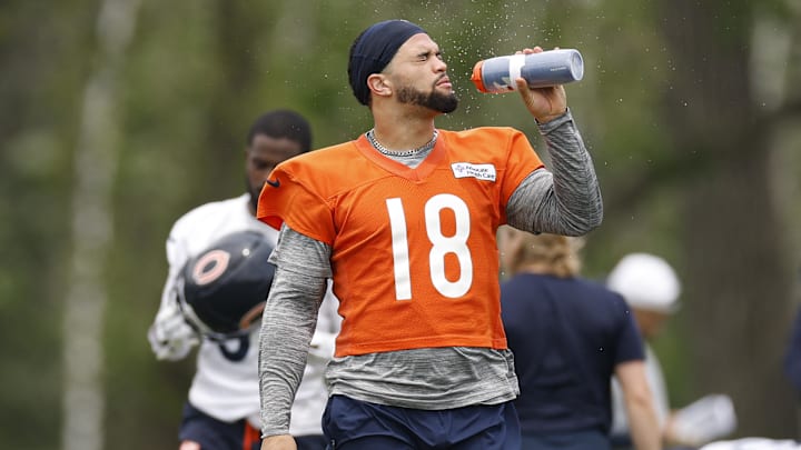 Jun 3, 2025; Lake Forest, IL, USA; Chicago Bears quarterback Caleb Williams (18) cools off during minicamp at Halas Hall. Mandatory Credit: Kamil Krzaczynski-Imagn Images