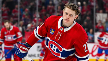 Apr 14, 2025; Montreal, Quebec, CAN; Montreal Canadiens center Christian Dvorak (28) looks on in warm-up before the game against the Chicago Blackhawks at Bell Centre.
