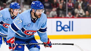 Feb 11, 2023; Montreal, Quebec, CAN; Montreal Canadiens left wing Jonathan Drouin (27) against the New York Islanders during the third period at Bell Centre. Mandatory Credit: David Kirouac-Imagn Images