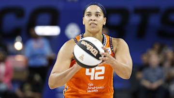 Jun 12, 2024; Chicago, Illinois, USA; Connecticut Sun forward Brionna Jones (42) shoots a free throw against the Chicago Sky during the first half of a basketball game at Wintrust Arena. Mandatory Credit: Kamil Krzaczynski-Imagn Images