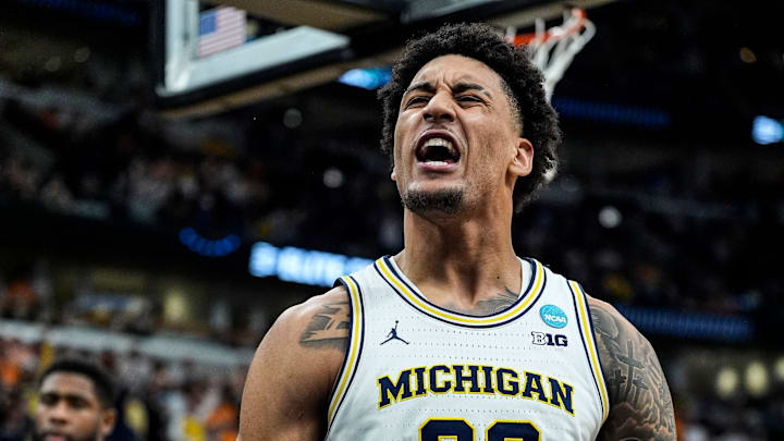 Michigan forward Yaxel Lendeborg (23) celebrates a dunk against Tennessee during the second half of NCAA Tournament Elite 8 round at United Center in Chicago on Sunday, March 29, 2026.