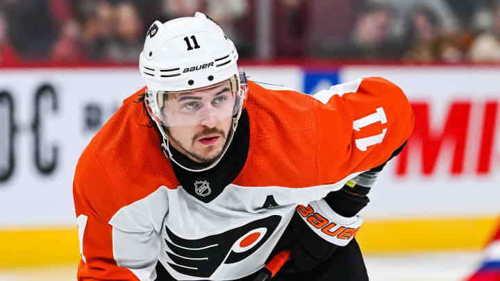 Philadelphia Flyers right wing Travis Konecny (11) waits for a face-off against the Montreal Canadiens.